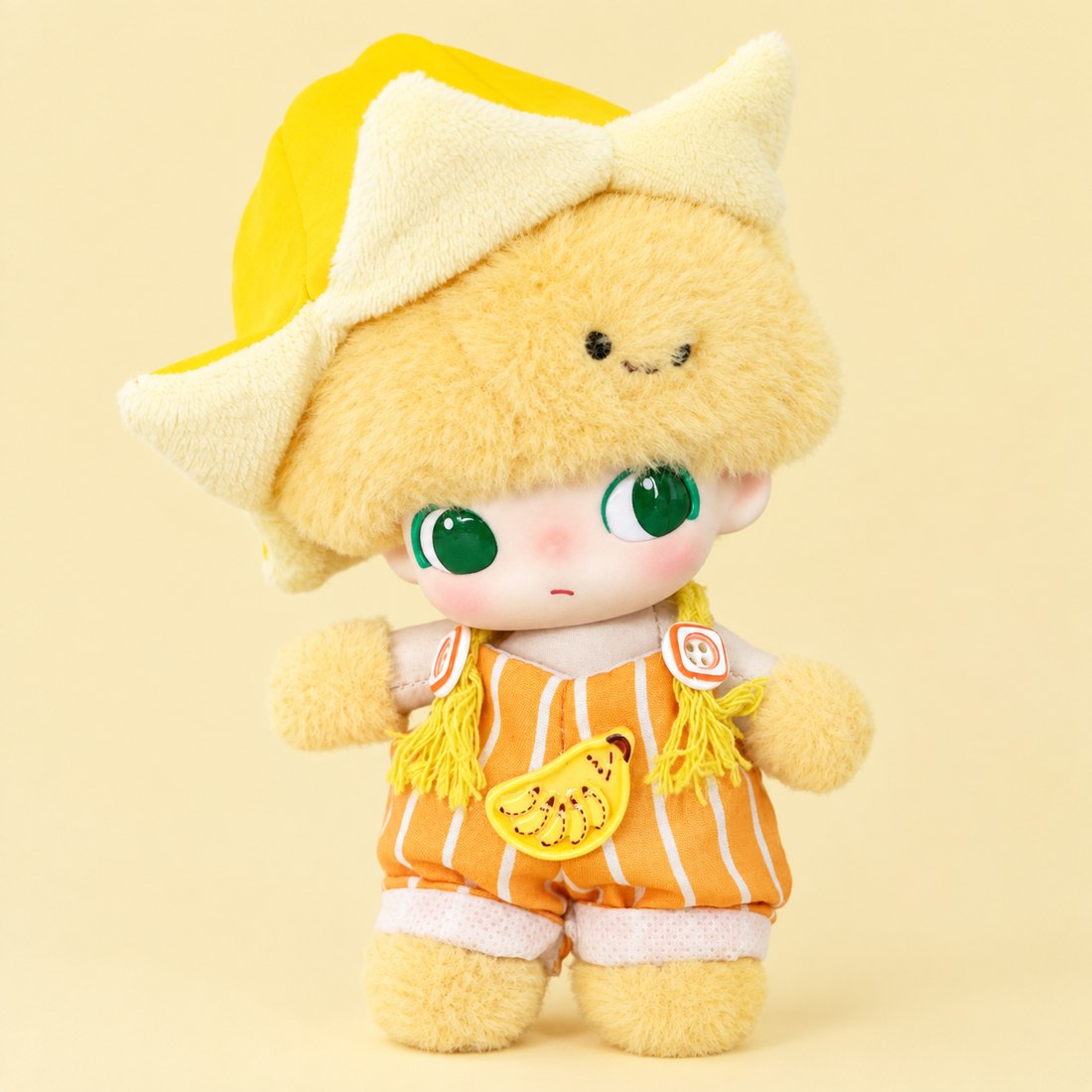 Small 10cm plush doll wearing banana print overalls with peel hat