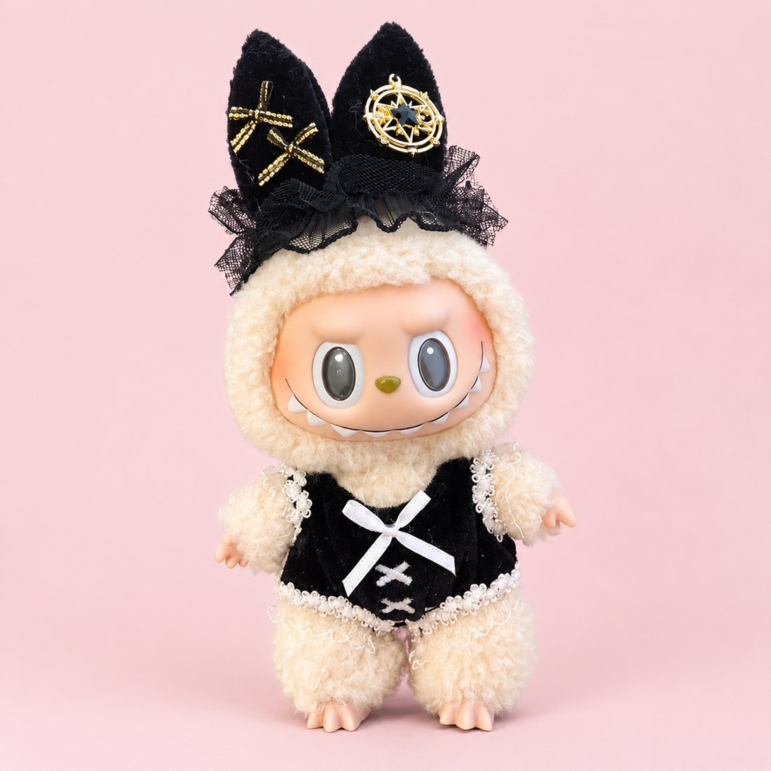 Plush doll wearing black velvet romper with gold stars, lace trim and cat-ear headband — doll clothes for 17 cm Labubu-style plushies