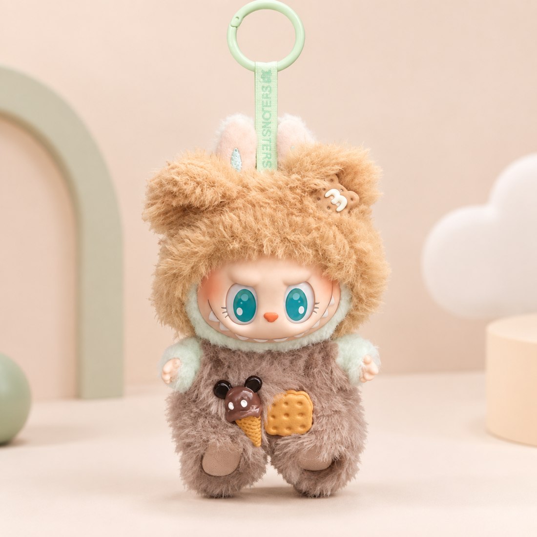 Plush doll wearing cookie bear themed outfit