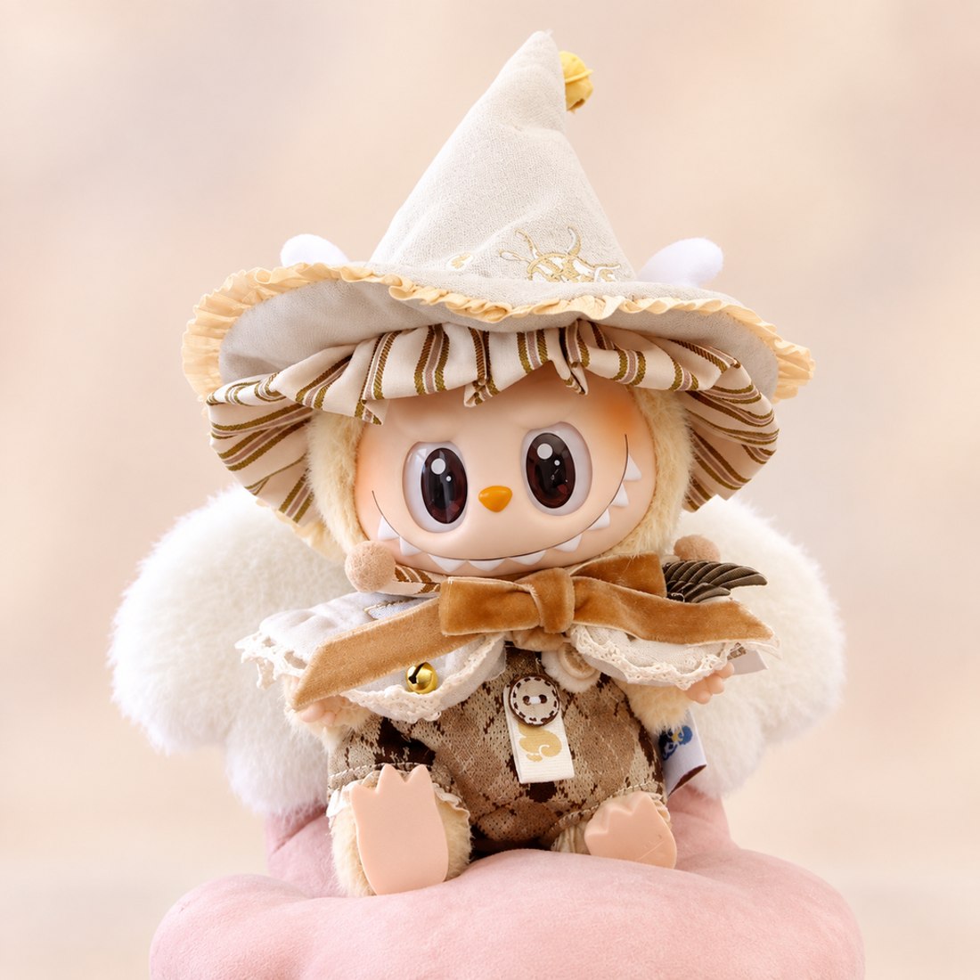 Plush doll wearing golden sorcerer wizard robe