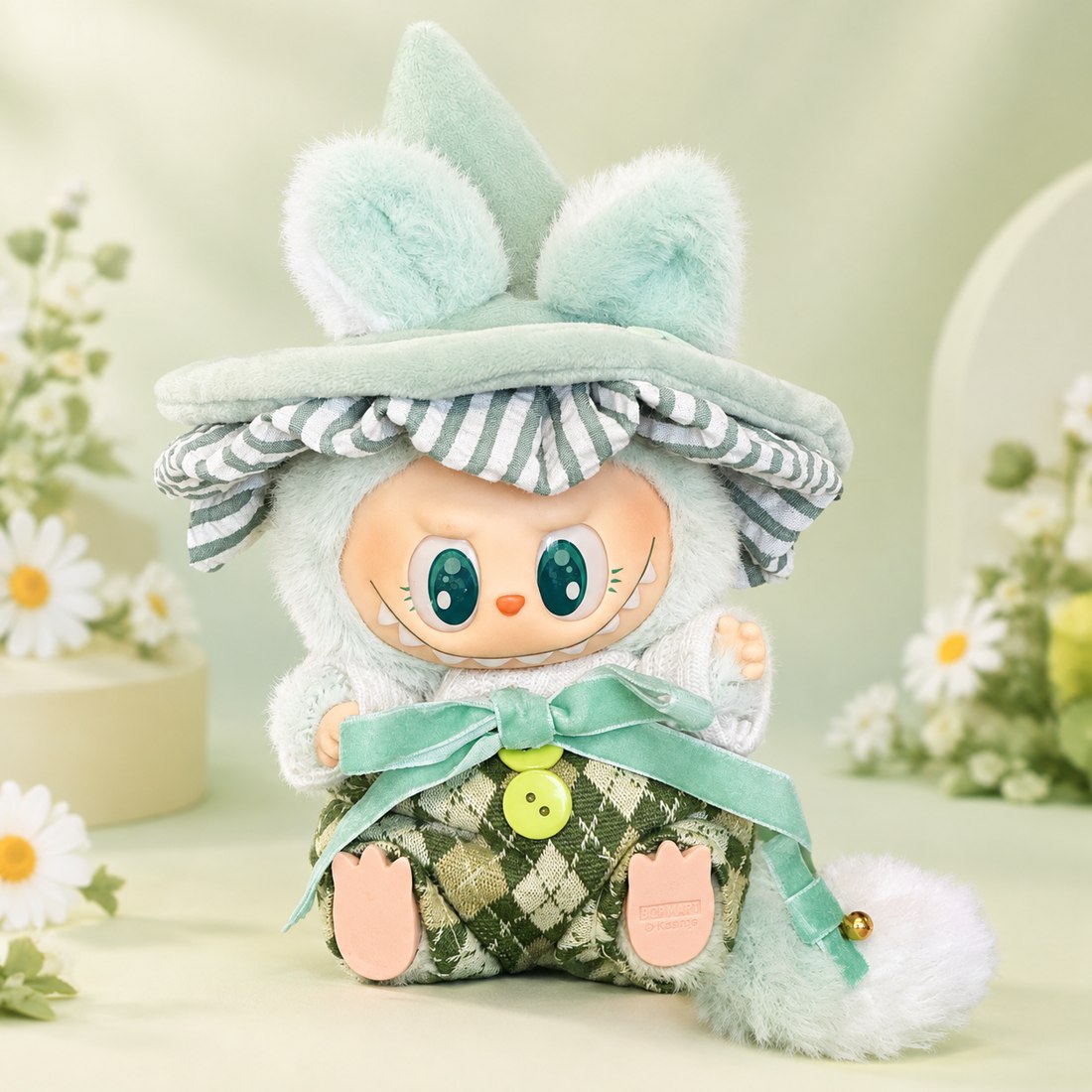 Plush doll wearing floral meadow sprite outfit with tail