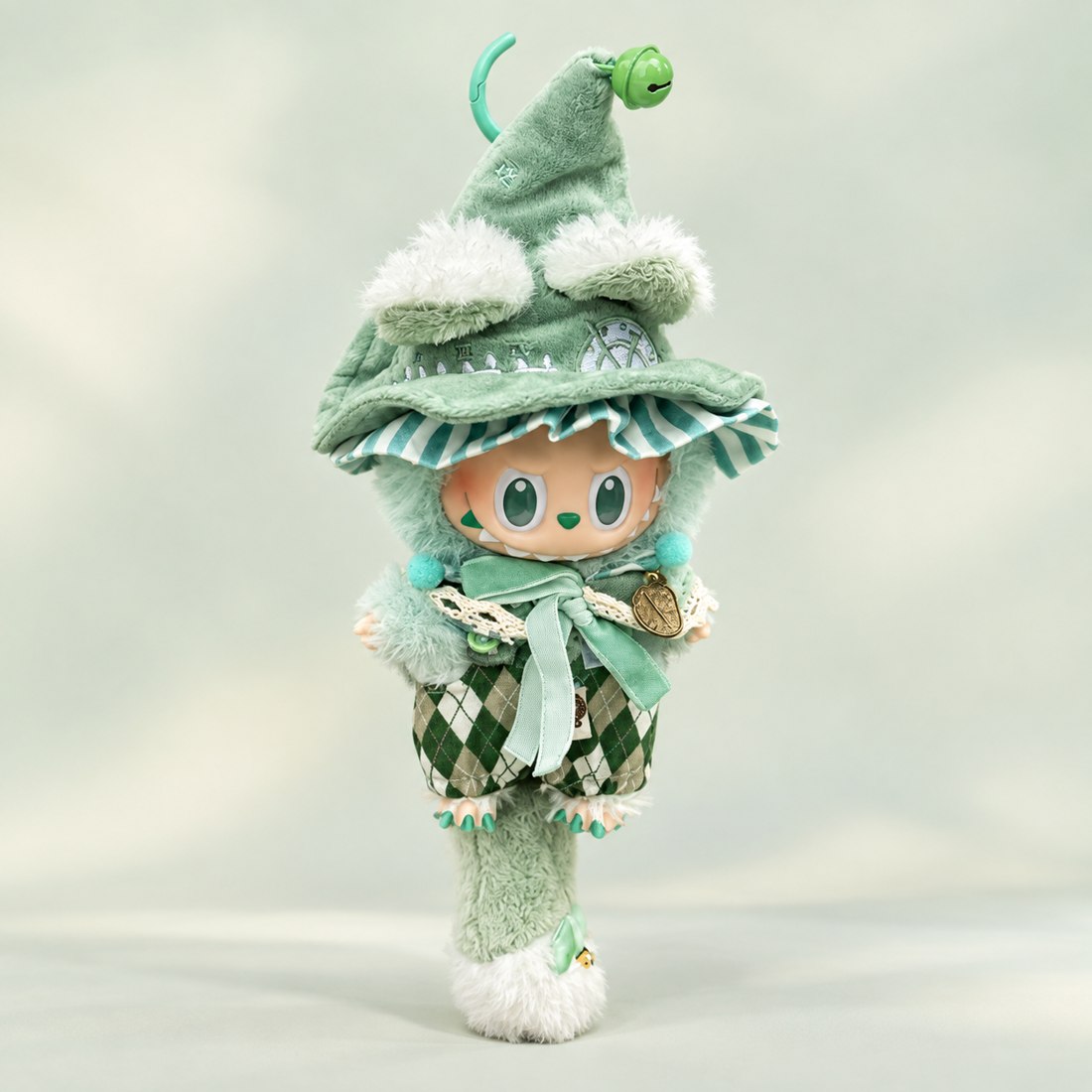 Plush doll wearing green sorcerer wizard robe set